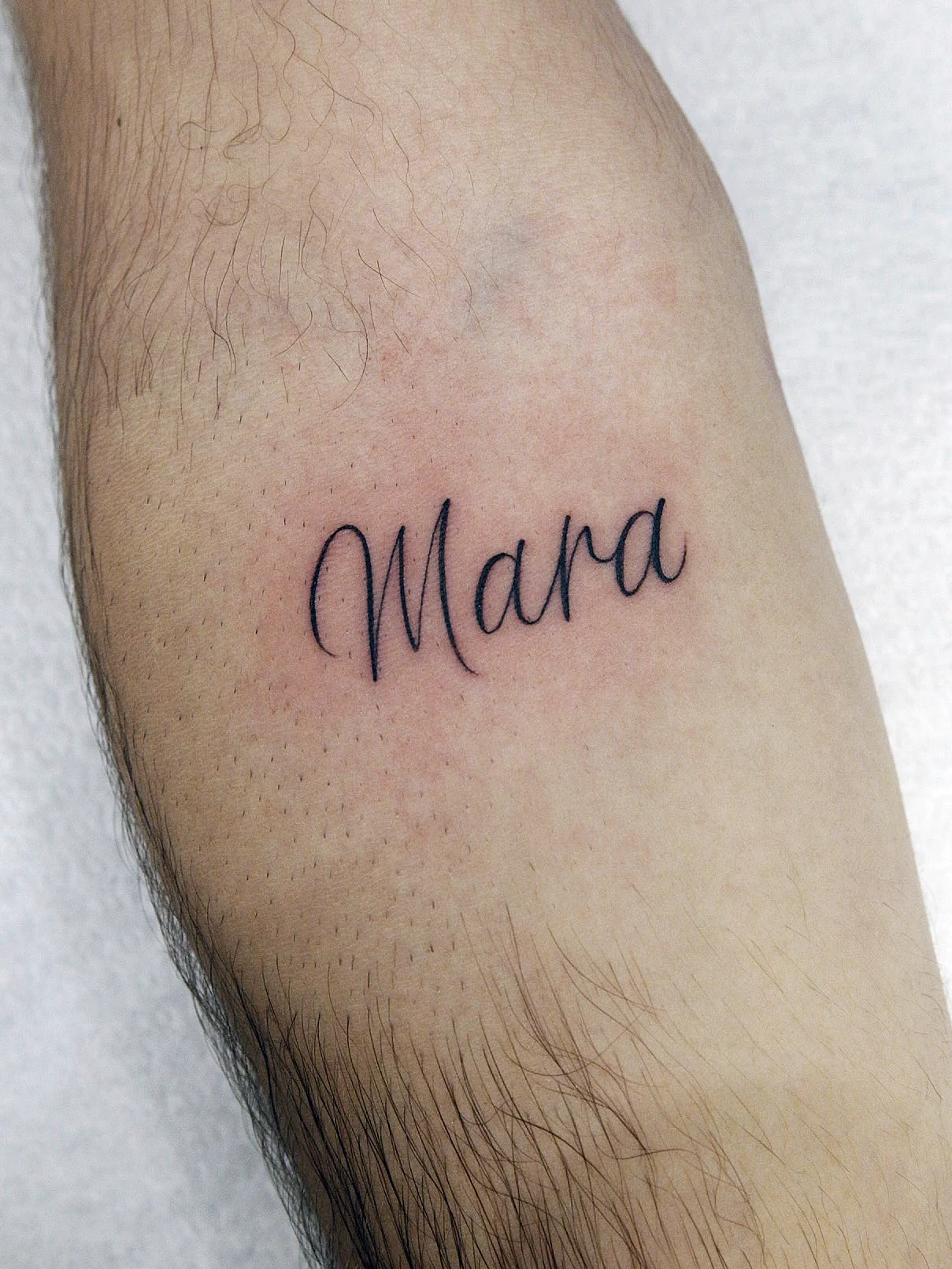 Tatuaje lineal texto Mamba Negra